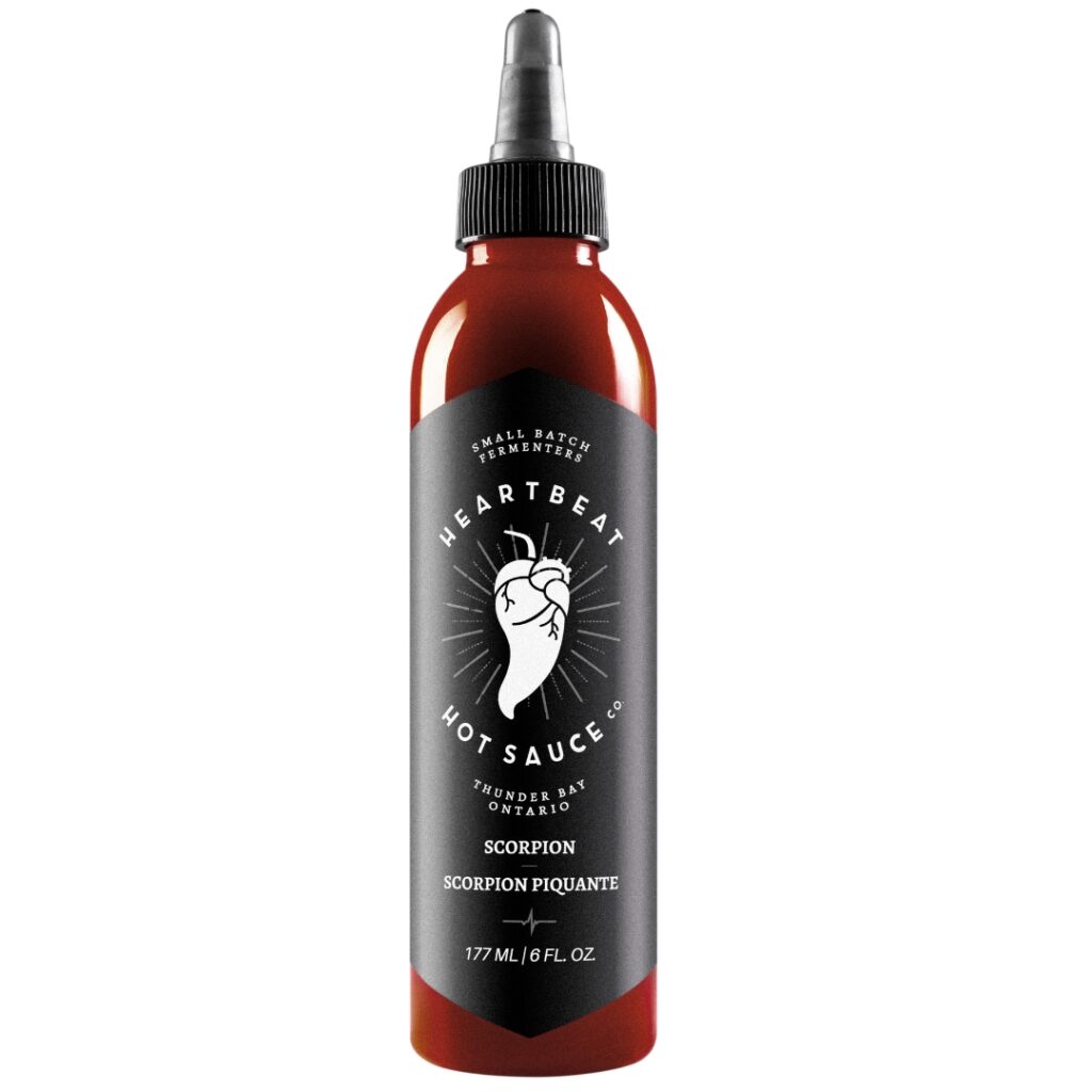As seen on Hot Ones Season 13, Heartbeat’s Scorpion hot sauce brings fiery heat with Trinidad Scorpion peppers, beets, chipotles, and bell peppers. Small-batch and all-natural, it’s a rich, bold sauce perfect for eggs, tacos, curries, and cocktails. A clean-label favorite for true spice lovers who crave flavor and fire.