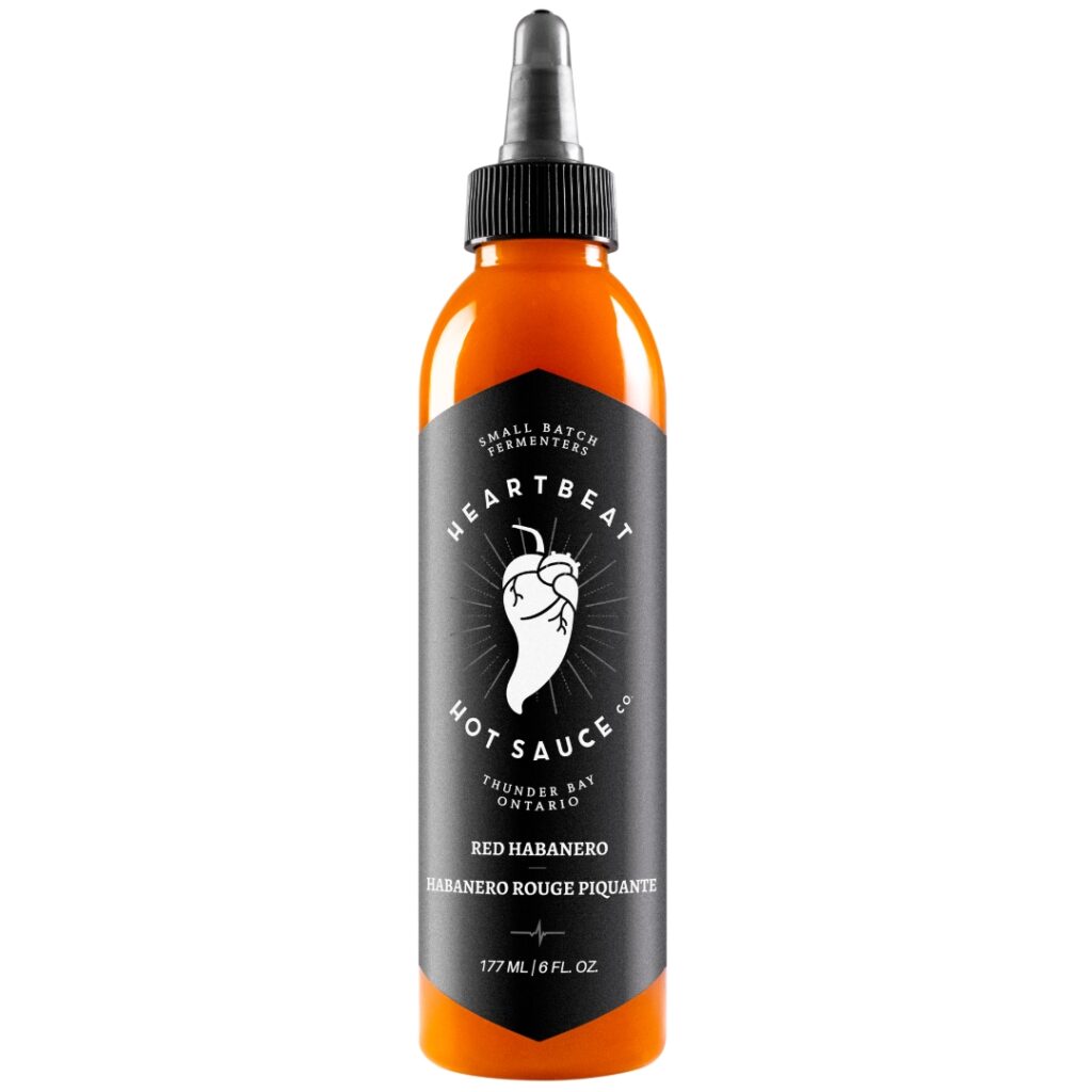 As seen on Hot Ones Season 6, Heartbeat’s Red Habanero hot sauce is where it all began. Crafted in small batches with red habaneros, bell peppers, and lime, it delivers balanced, fruity heat and bold flavor. Clean, all-natural, and endlessly versatile—perfect for Indian snacks, wings, curries, pizzas, and spicy cocktails.
